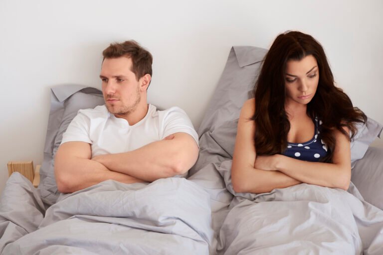 Doctor consulting male patient about premature ejaculation treatment options